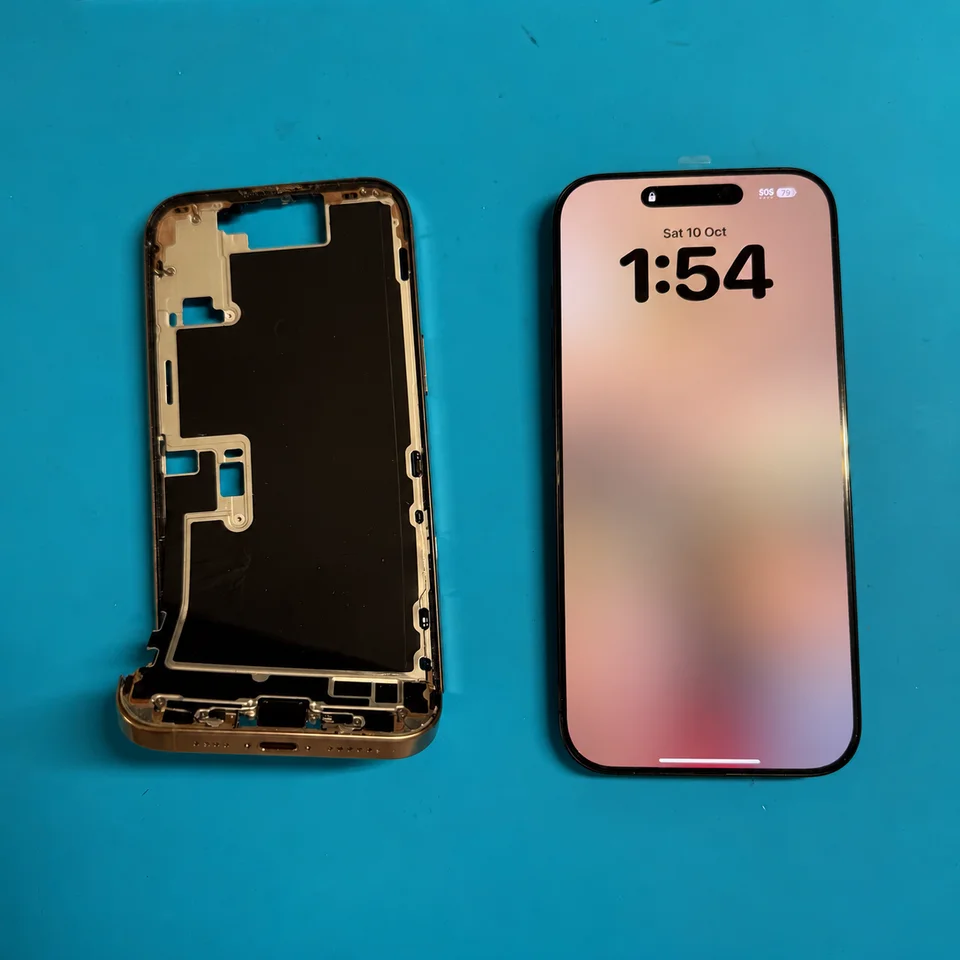 Front view of the iPhone beside the removed housing, with personal wallpaper obscured